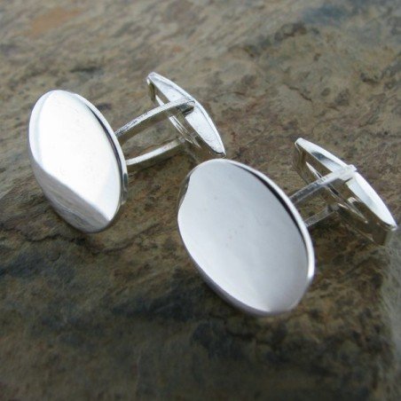 Gemelos de plata con forma oval Gemelos de plata con forma oval